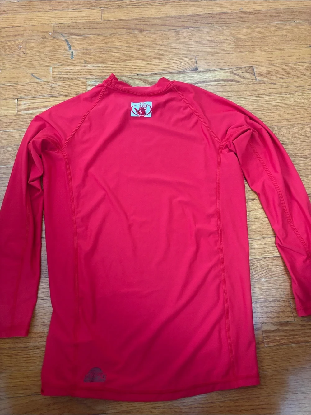 Body Glove blue and red rash guard tops